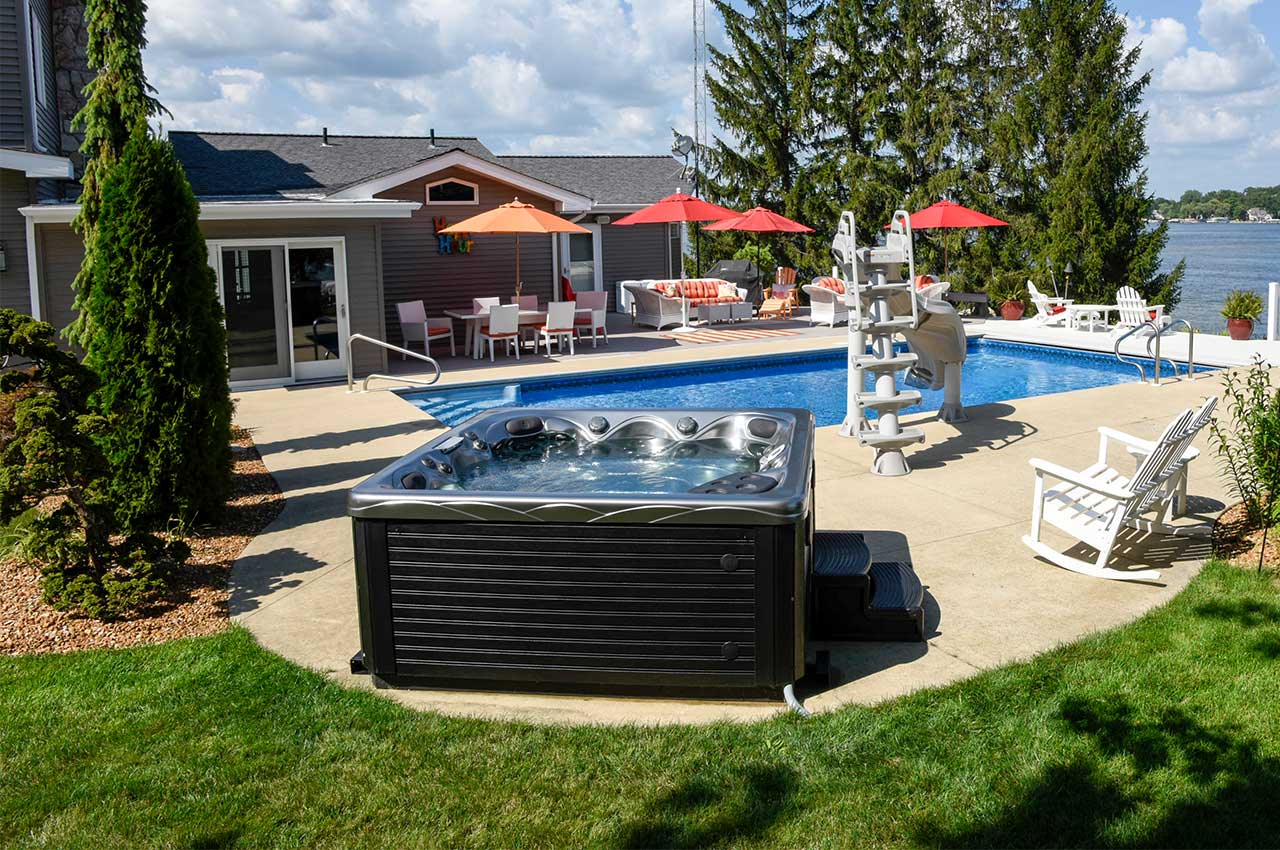 Hot tub next to pool install